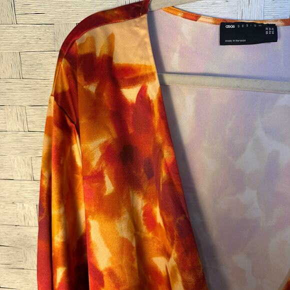 ASOS DESIGN Curve satin long sleeve wrap front mini dress orange abstract print - Picture 10 of 14